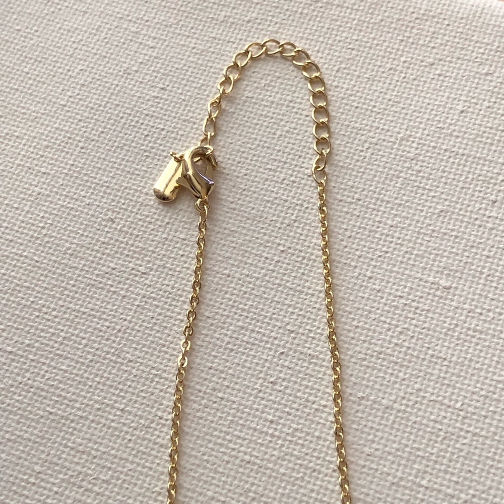 Gold-Tone Crystal Bar Necklace with Four-Leaf Clover Charm - Picture 3 of 3